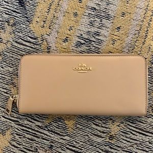 Beautiful beige coach long wallet! Never used!